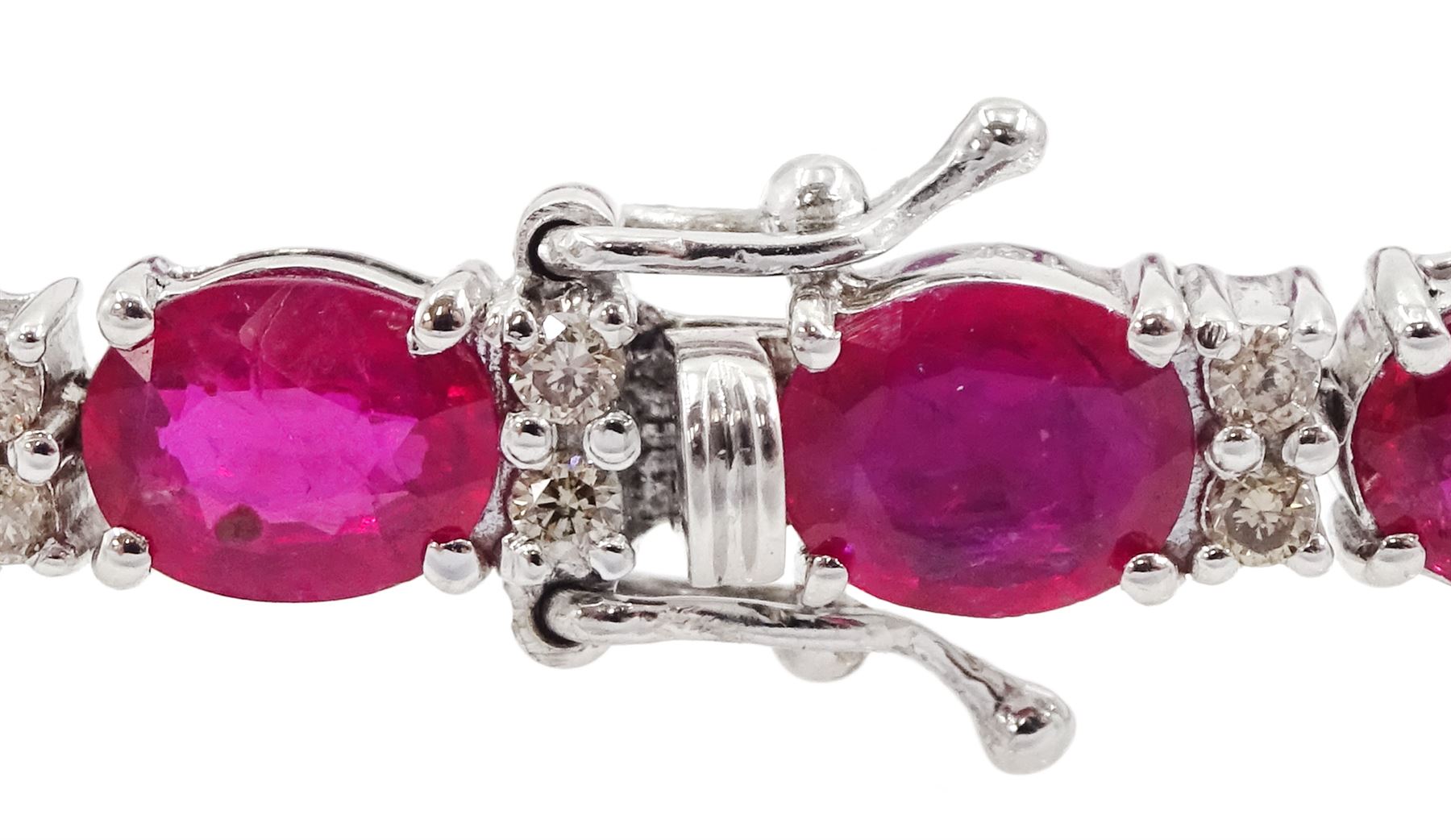 18ct white gold oval ruby and round brilliant cut diamond bracelet, stamped, total ruby weight approx 9.65 carat