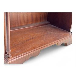 Mid-20th century mahogany open bookshelf, the rectangular top with a brass balustrade gallery, over three shelves each supported by turned column uprights, on shaped apron base