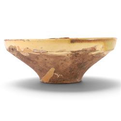 Spanish twin handled cooking pot, blackened to the outside, together with two bowls with slipware glaze, pot H22cm 