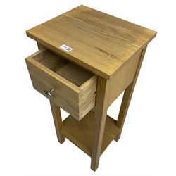 Light oak bedside stand, fitted with single drawer, on square supports joined by under-tier 