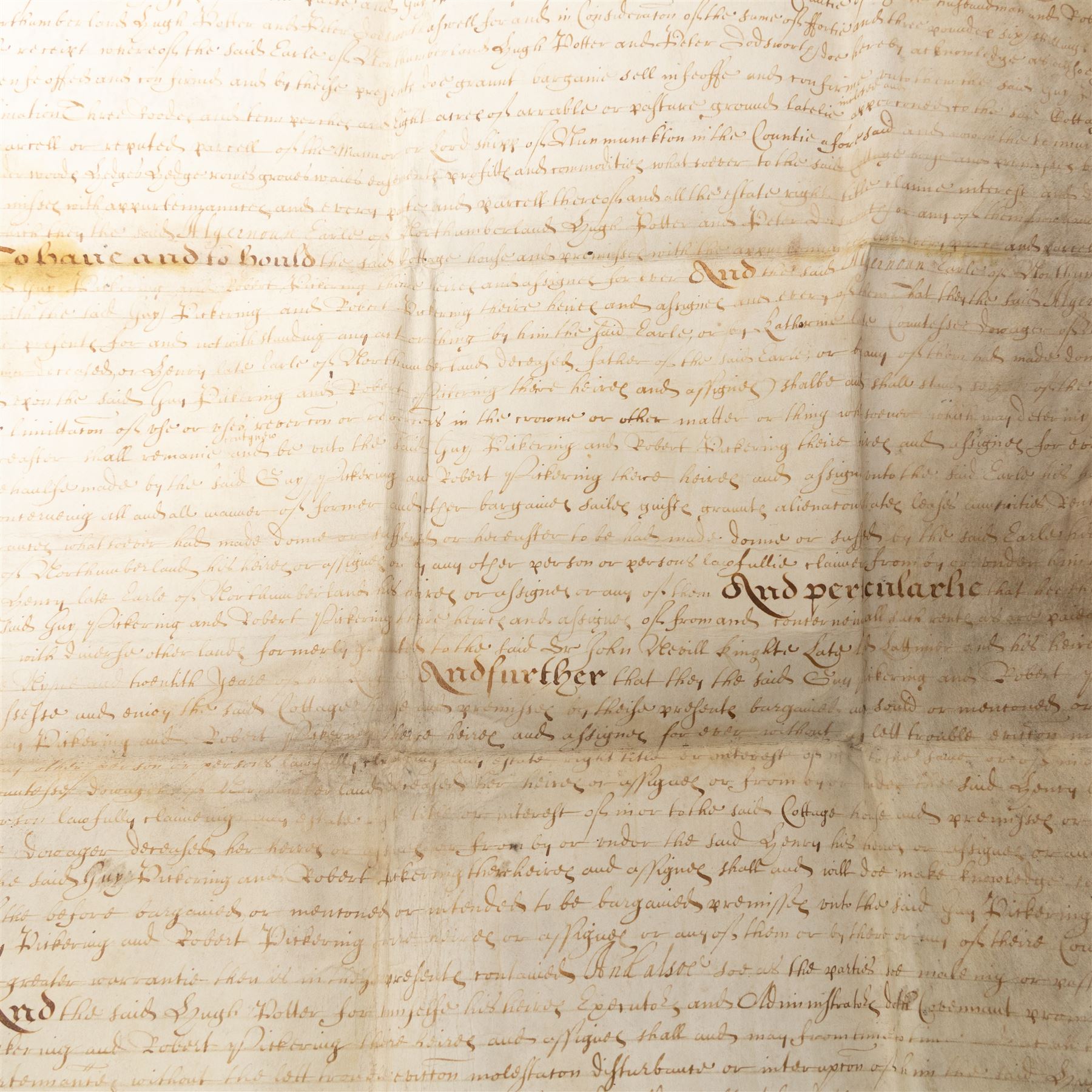 Algernon Percy, 10th Earl of Northumberland: English Civil War period vellum indenture, dated 16 August 1647, between Algernon Percy, Earl of Northumberland and Elizabeth, Countess of Northumberland, relating to a cottage, garth and lands at Hunmanby, Yorkshire, granted to Guy Pickering and Robert Pickering, with reference to Hugh Potter and Peter Dodsworth, manuscript on vellum with decorative initial, pendant seal tag and signatures/witnesses verso

Notes:
Algernon Percy, 10th Earl of Northumberland (1602-1668), was Lord High Admiral to Charles I and later a leading moderate Parliamentarian during the English Civil War. Dated August 1647, this indenture was executed in the aftermath of the First Civil War, while Percy was closely involved in Parliamentary government and in the custody of the King’s younger children. The document concerns property at Hunmanby, Yorkshire, and includes reference to tenure connected with the Crown and King Henry VIII