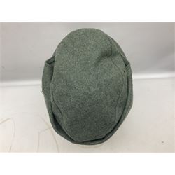 WW2 German Army M43 field cap with triangular cloth eagle and roundel badge and metal edelweiss badge for mountain troops; faintly stamped '5 VMF(?)'