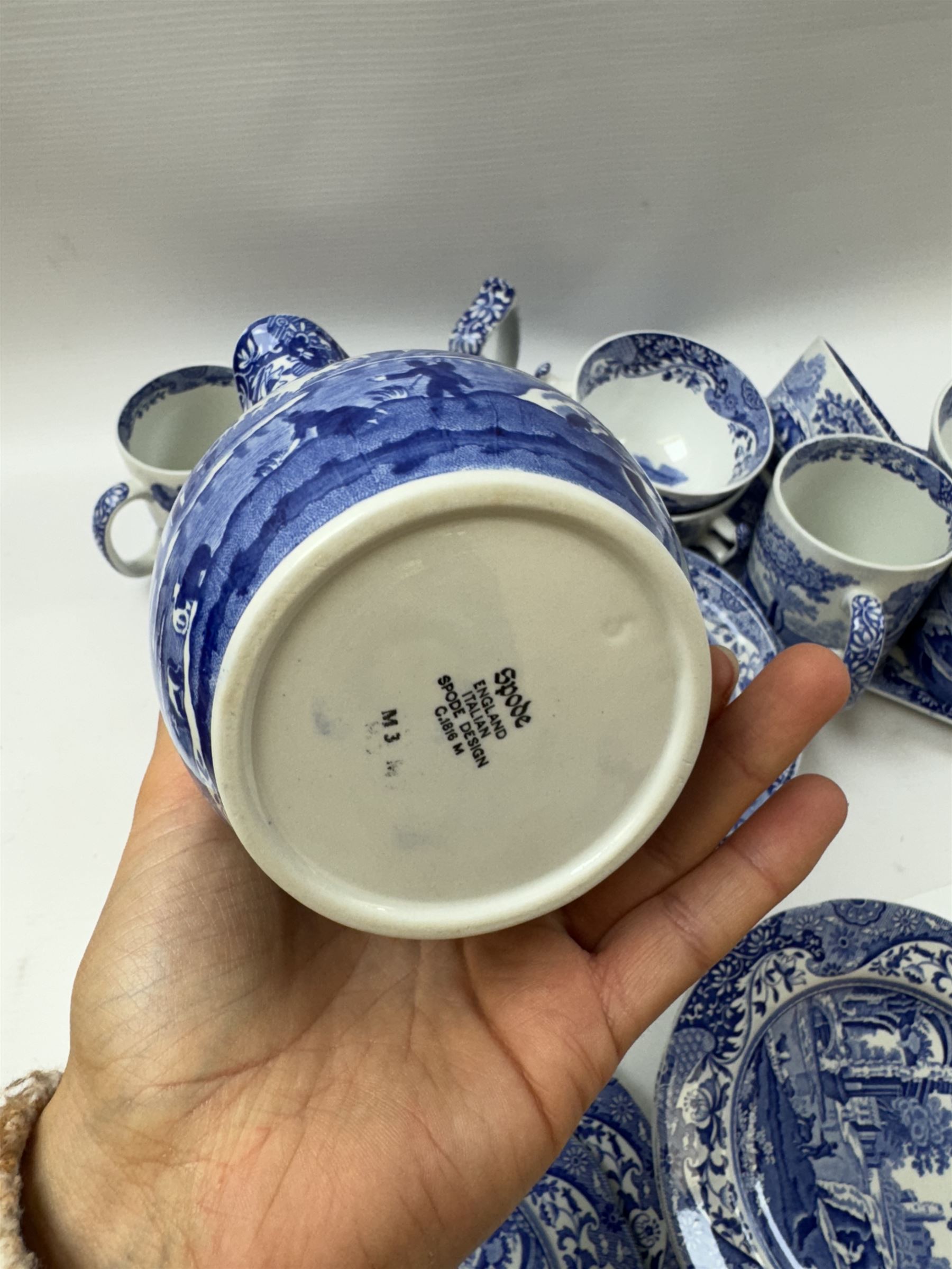 Spode Italian pattern tea service, comprising teapot, milk jug, open sucrier, six cups and saucers, two coffee cans and saucers, six dessert plates, four mugs and a sandwich plate (30) 
