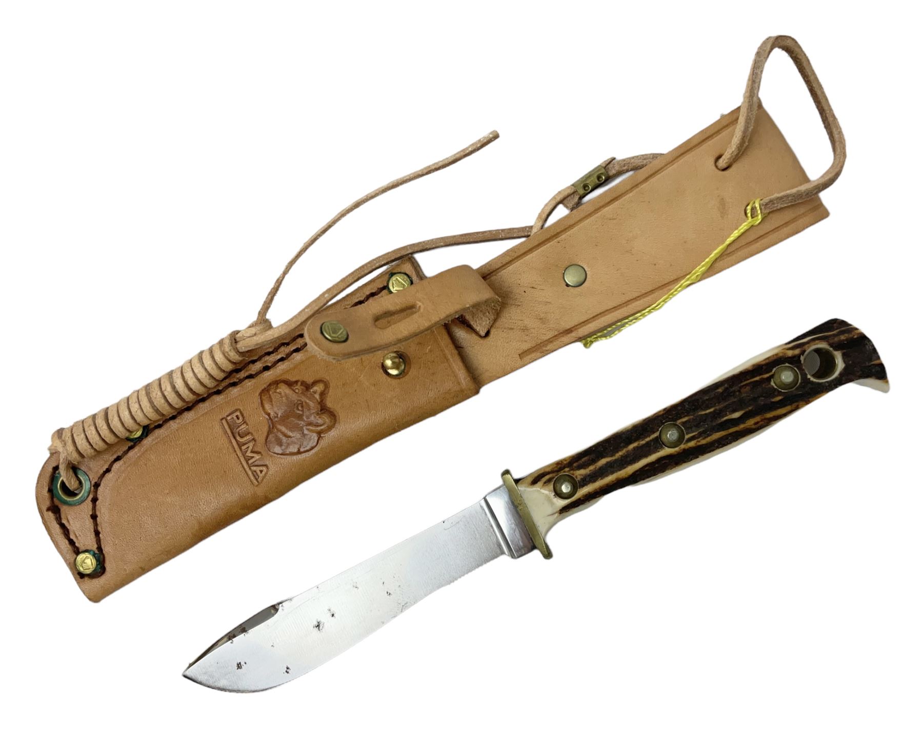 German Puma Hunter's-Pal knife, the 10cm steel blade marked model 6397, serial No.72573 to guard, fixed blade, antler scales; in original hard plastic case with paperwork and guarantee label; with brown leather sheath marked Puma L22.5cm overall