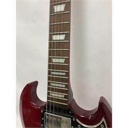 Vintage VS6M Reissued Series six string electric guitar, with solid body in cherry red finish, in carrying case, guitar L103cm