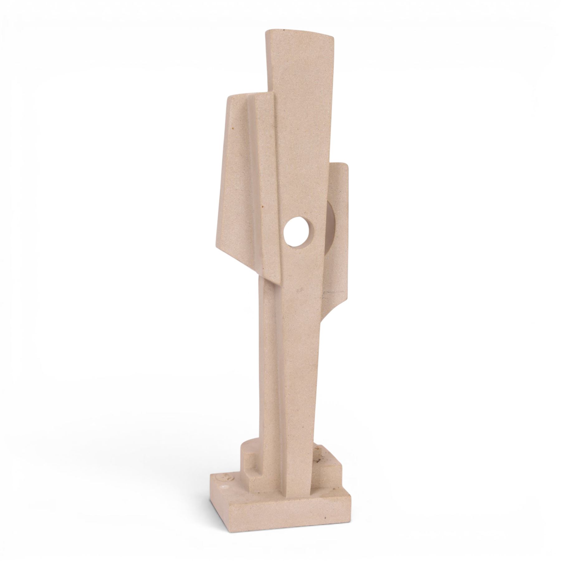 Abrstact stone sculpture, of geometric shapes with a central circular gap, raised upon a stepped rectangular base, H36cm