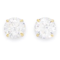 Two pairs of 9ct gold cubic zirconia stud earrings,