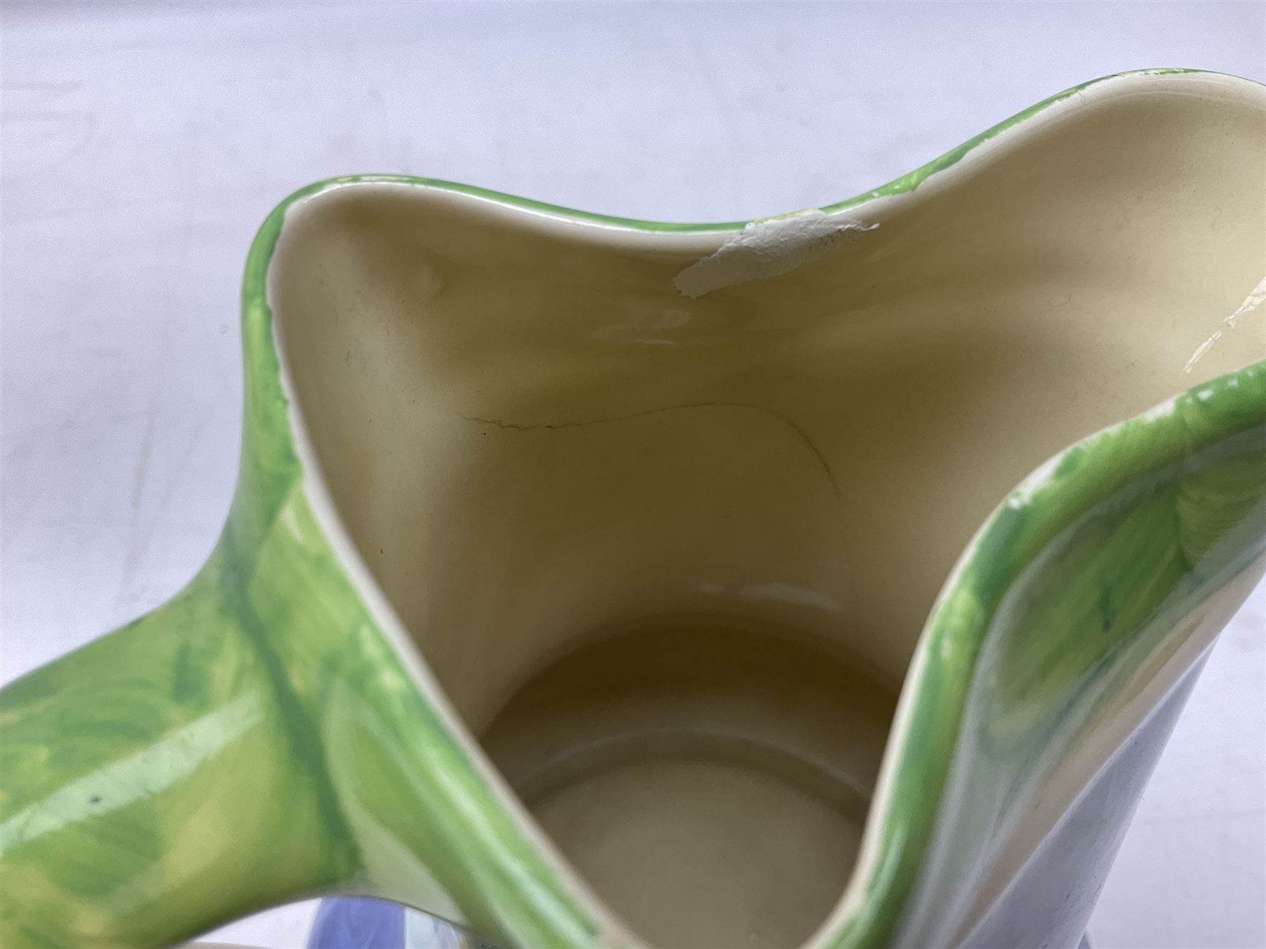 Seven Myott Son & Co hand painted jugs, all with printed mark beneath, H21cm