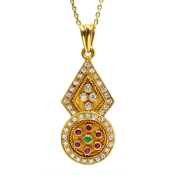  18ct gold solid pendant with diamond borders, diamond, ruby and emerald set raised tubes stamped 750  