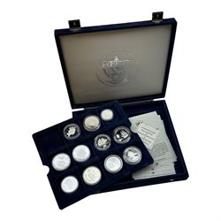 Eleven silver coins from 'The Official Silver Commemorative Coin Collection Ships and Explorers' all with certificates, housed in the official collectors case