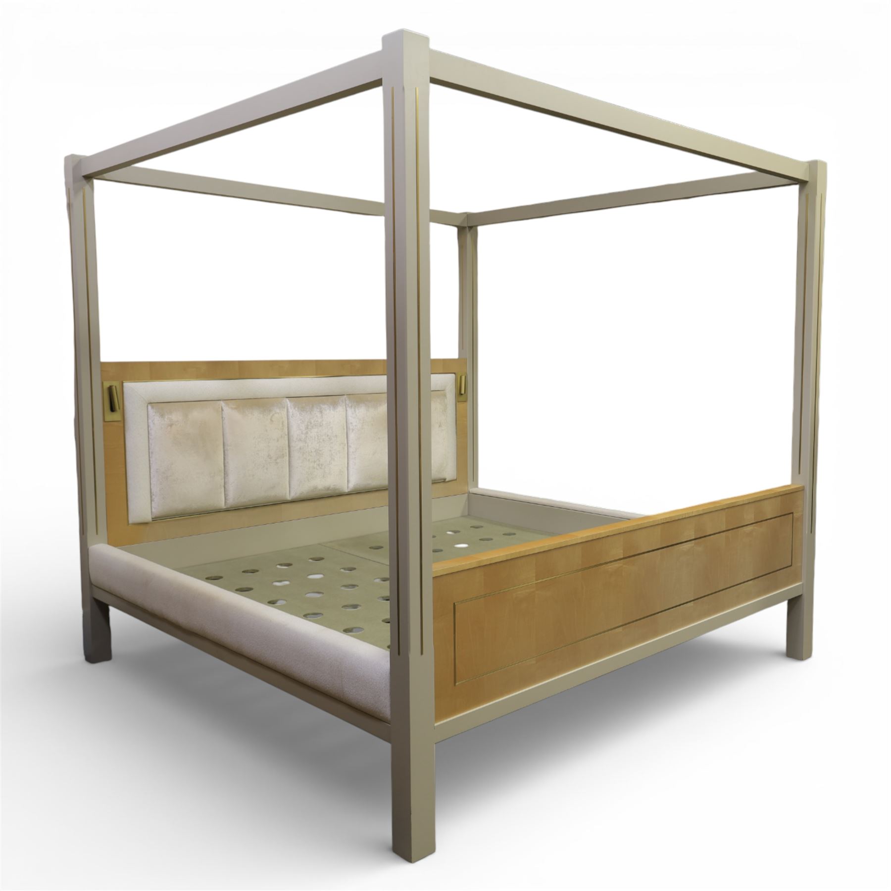 Contemporary maple and inlaid brass Emperor sized four poster bed, rectangular canopy frame with square section uprights, panelled headboard incorporating a padded upholstered inset, flanked by brass reading light fittings, low footboard with moulded panel detail, raised on square inlaid brass supports