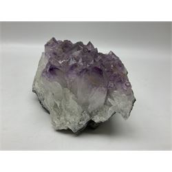 Amethyst crystal geode cluster, with well-defined crystals of various sizes, H10cm, L30cm