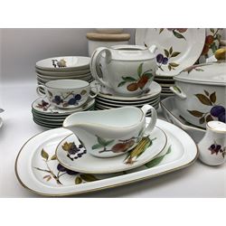 Worcester Evesham patter tea and dinner wares comprising eight dinner plates, seven dessert plates, eight bowls, six cups and saucers, eight tea plates, two covered vegetable dishes, three graduated storage jars, various serving dishes, condiments etc (64)
