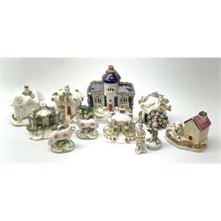 Five Victorian Staffordshire houses, a Coalport example, a Victorian Staffordshire model of a dog kennel with dog and puppy, and four Continental figures, to include a pair of sheep before bocage, each with spurious gold anchor marks. 