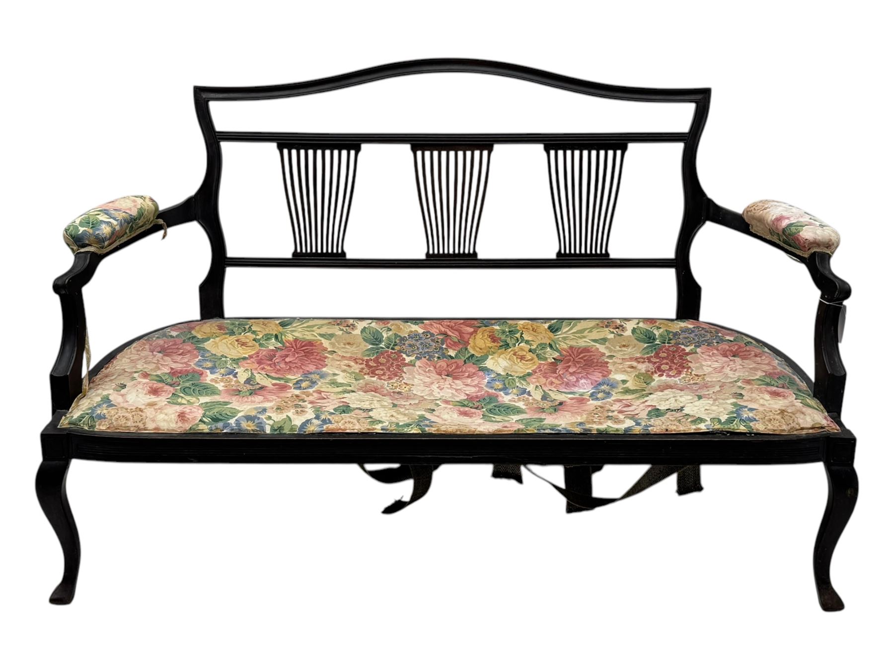 Edwardian mahogany three seater settee, upholstered in floral fabric. Shield back with padded armrests and cabriole legs  