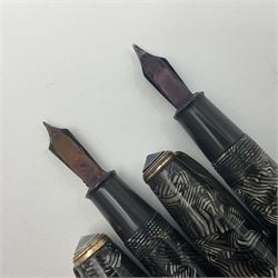 Conway Stewart Executive 60 fountain pen, the barrel and cap with hatched grey and black marble decoration and gold nib stamped Duro 14ct, together with a Conway Stewart 58 fountain pen similarly decorated in pearl blue and black with gold nib stamped 14ct, largest 13cm (2)