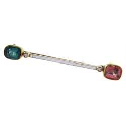 Early 20th century Austrian 14ct gold tourmaline, diamond and white enamel bar brooch, each end set with a green and pink tourmaline and a single stone diamond chip, by Ernst Paltscho (Vienna 1858-1929) hallmarked, in original fitted silk lined box 