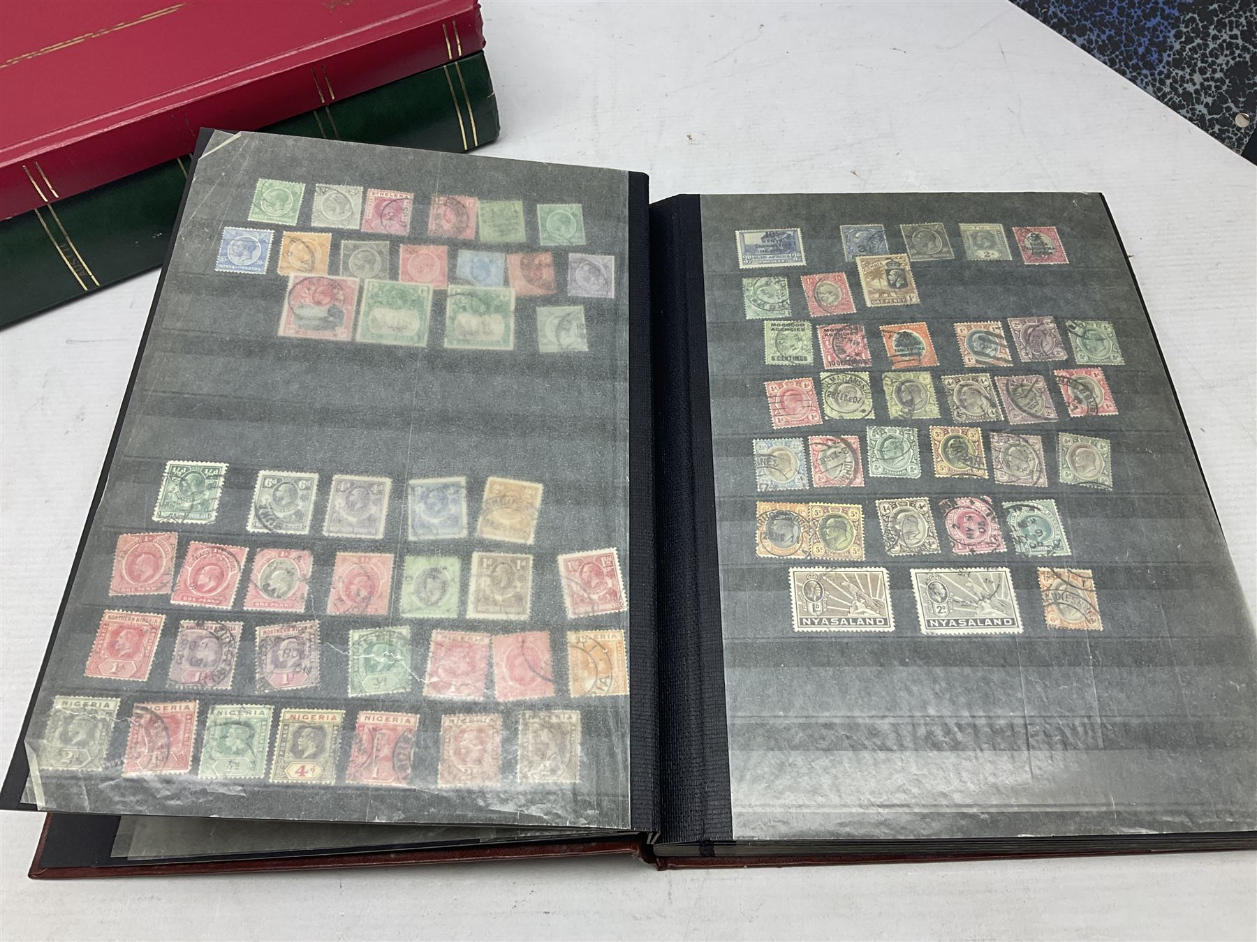Stamps including Queen Victoria Queensland, modern Australia, King Edward VII Ceylon and Mauritius, South Africa, Gambia, Falkland Islands, Gold Coast, Ireland etc, housed in seven albums/folders and on loose album pages, in one box