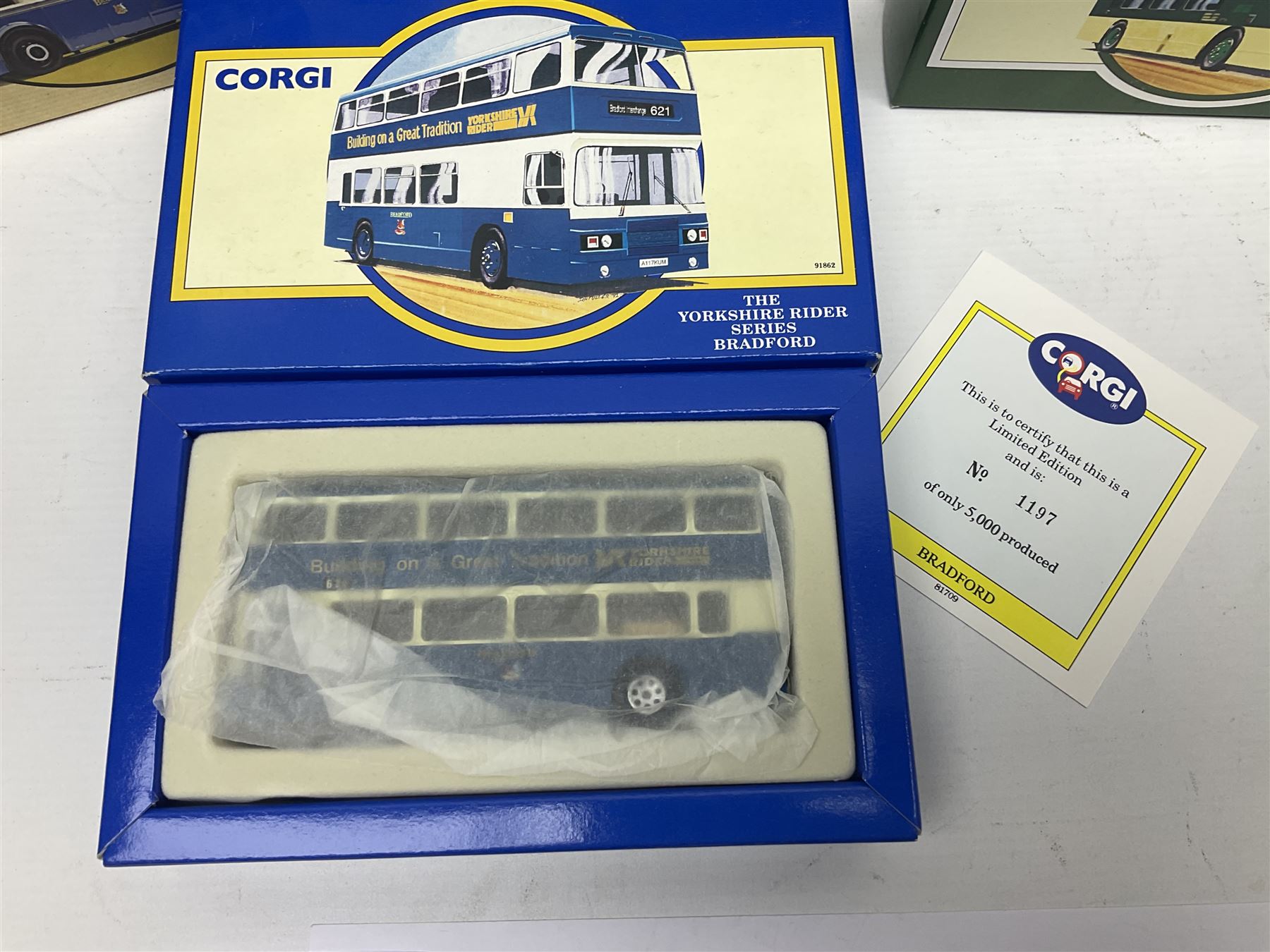Corgi - twenty eight modern die-cast model coaches, buses and wagons to include Corgi Classics 35305, 96991, 97002, two 97108, 97208, 97267, 97335, 97871 and 98162; limited edition sets D949/26, 97107 and 97185; The Yorkshire Rider Series 91700, 91853, 91858 and 91862; all but one in original boxes or perspex display cases, most with certificates (27)