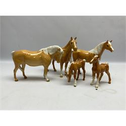 Five Beswick figures of Palomino horses, comprising mare no 1812, huntsman's horse no 1484, mare no 1991 and two standing foals, all with printed marks beneath