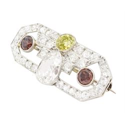 Early 20th century platinum diamond brooch, milgrain set with a pear cut faint brown diamond of approx 1.50 carat, an old cut fancy yellow / green diamond of approx 0.70 carat, and two old cut fancy orange / brown diamonds of approx 0.40 carat and 0.35 carat, surrounded by old cut white diamonds in an openwork setting, total white diamond weight approx 1.45 carat
