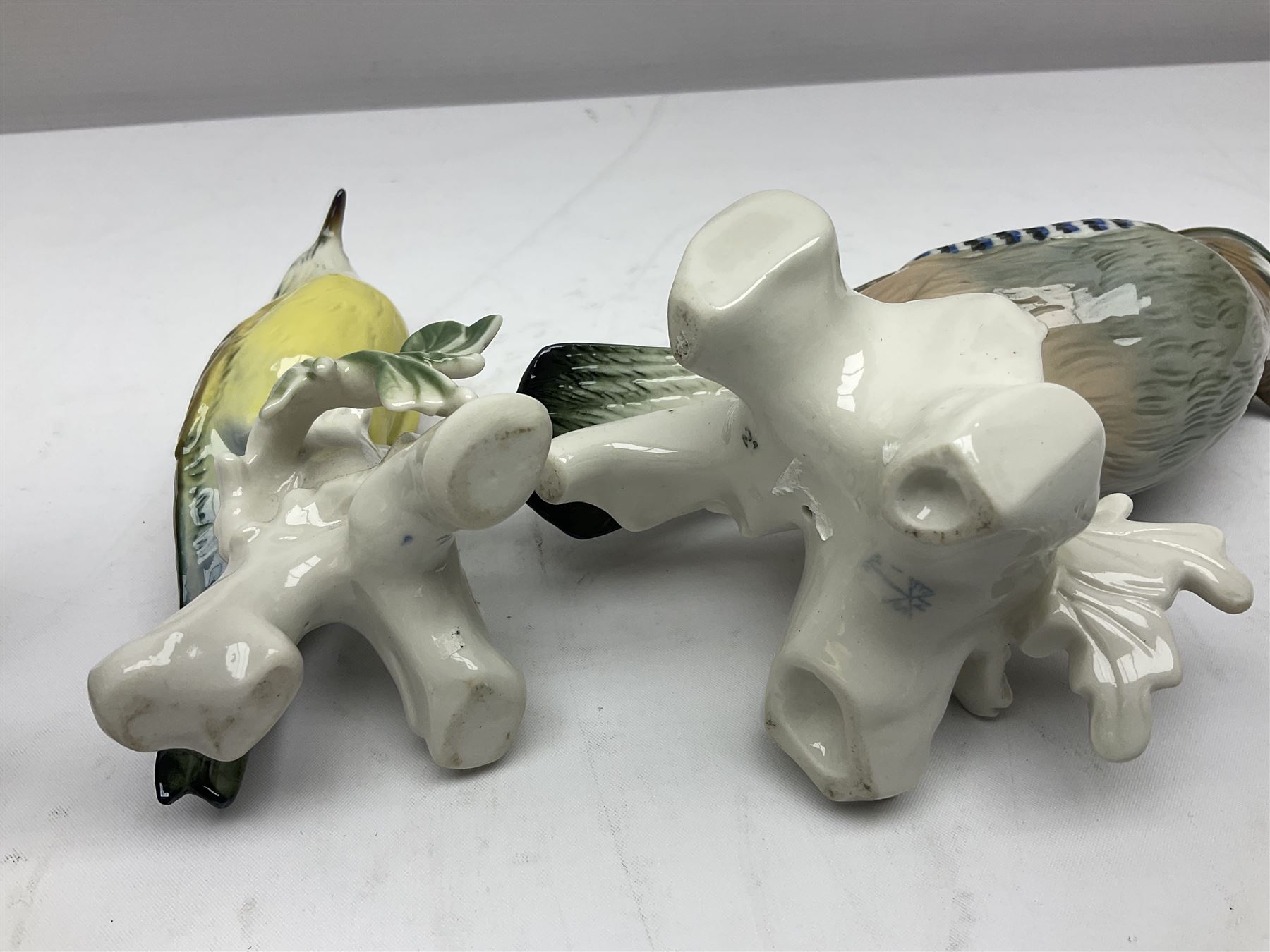 Eight Karl Ens bird figures, together with Mack blue tit and one other