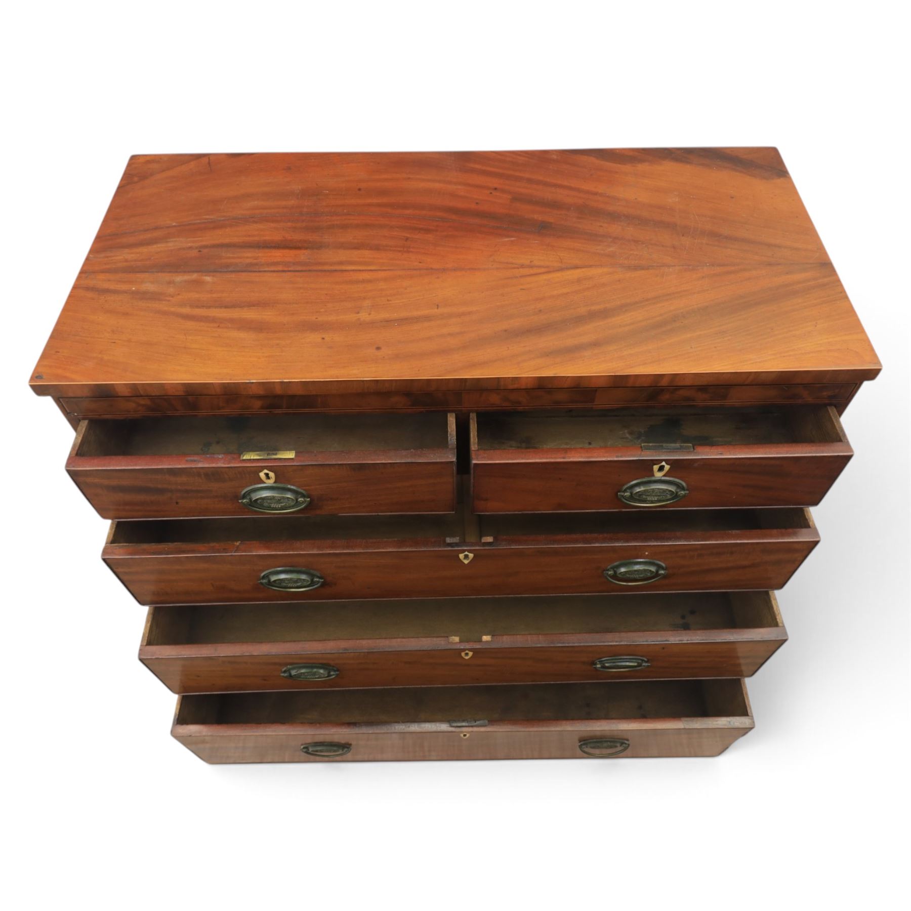 19th century mahogany chest, two short over three long drawers with brass handles, raised on shaped feet