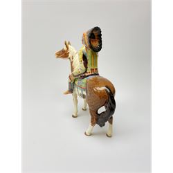 A Beswick Native American on horseback, with printed mark beneath, H21.5cm. 