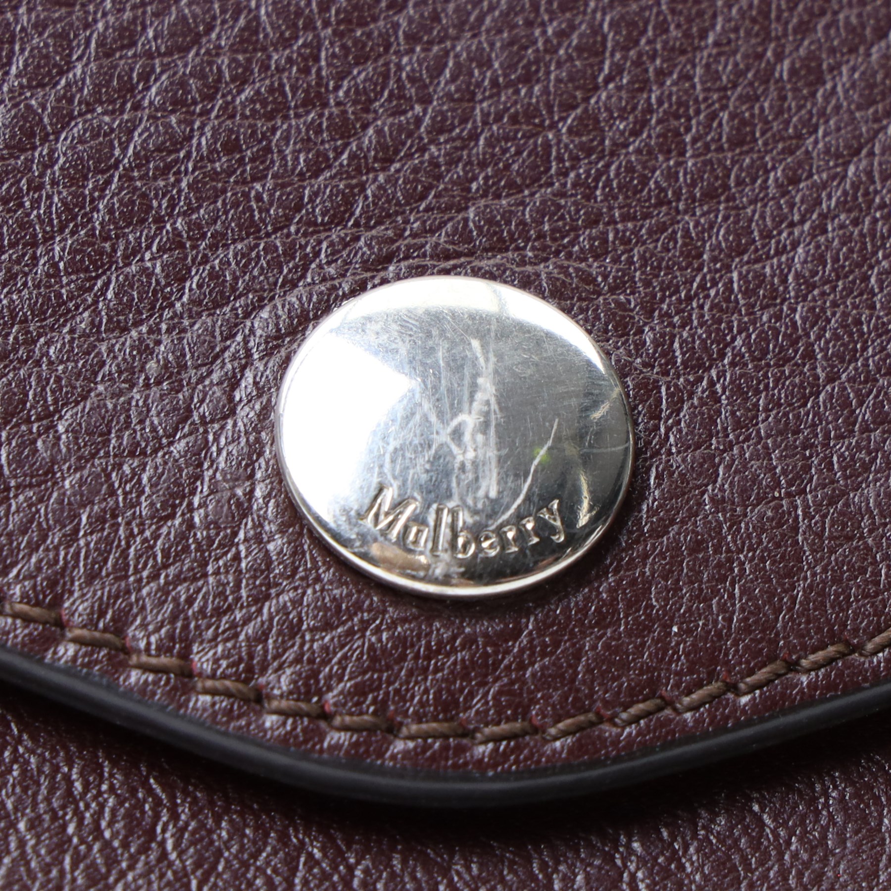 Mulberry - dark burgundy leather clutch pouch, the envelope flap with press-stud fastening and oversized silver-tone stud detailing to the corners, suede-lined interior, with original dust bag