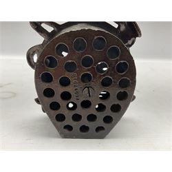 Four cast-iron money banks - 'Bear On Hind Legs bank' c1906 H16cm; 'ERII English Throne Bank' 1953 H21cm; both made by John Harper; 'Tally-Ho Bank' c1906 by Chamberlain & Hill H11.5cm; and 'Westminster Abbey Bank' c1908 by Sydenham & McCoustra H16cm (4)