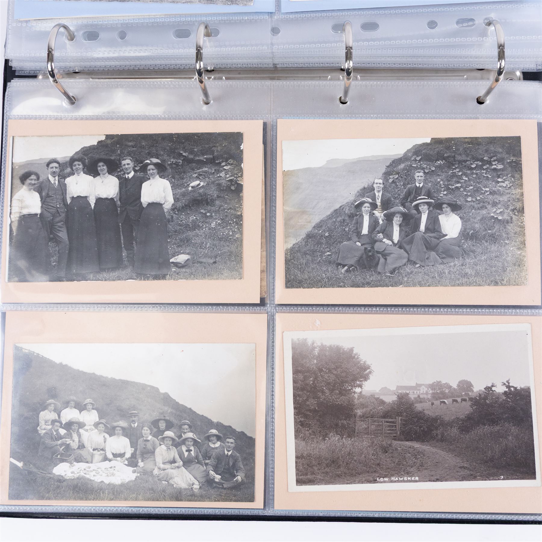 Four-hundred and twelve early 20th century Whitby District view real photographic postcards, including a selection from the Whitby Coast (176), starting at Staithes and Runswick Bay down to Robin Hoods Bay and a selection from the Valley of the River Esk (236), including Ruswarp, Rig Mill, Sneaton, Sleights, Grosmont, Egton, Glaisdale, Danby, Castleton and Goathland, all housed within two postcard albums
