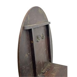 George III mahogany breakfast table, the oval top with a kingwood band and boxwood stringing, raised on a turned vasiform pedestal terminating in a fluted sabre tripod base with hairy paw feet and castors