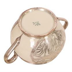 Jacob Hertel Bavarian tea service, decorated with silvered overlay of birds in foliage, comprising teapot, milk jug, covered sucrier three cups and saucers 