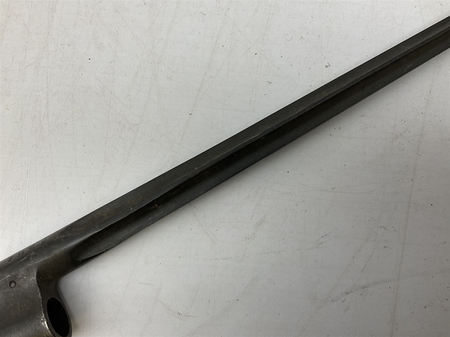 British Pattern 1876 socket bayonet with 43cm steel triangular blade L52cm overall; another socket bayonet with cruciform blade; No.4 Mk.II spike bayonet in metal scabbard with webbing frog; and 1955 Army jack knife by J.H. Thompson Sheffield (4)