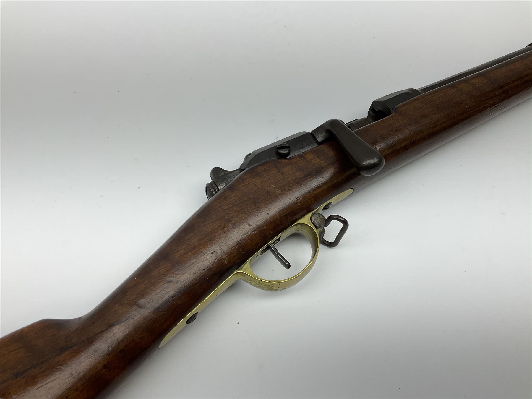 French Model 1866 Chassepot 11mm bolt-action needle fire rifle, the 70.5cm barrel stamped with various proof marks, the action inscribed 'Manufacture D'Armes St. Etienne Mle 1866-74', walnut full stock with brass mounts, stock stamped 8798, under barrel ramrod and two sling swivels L117cm