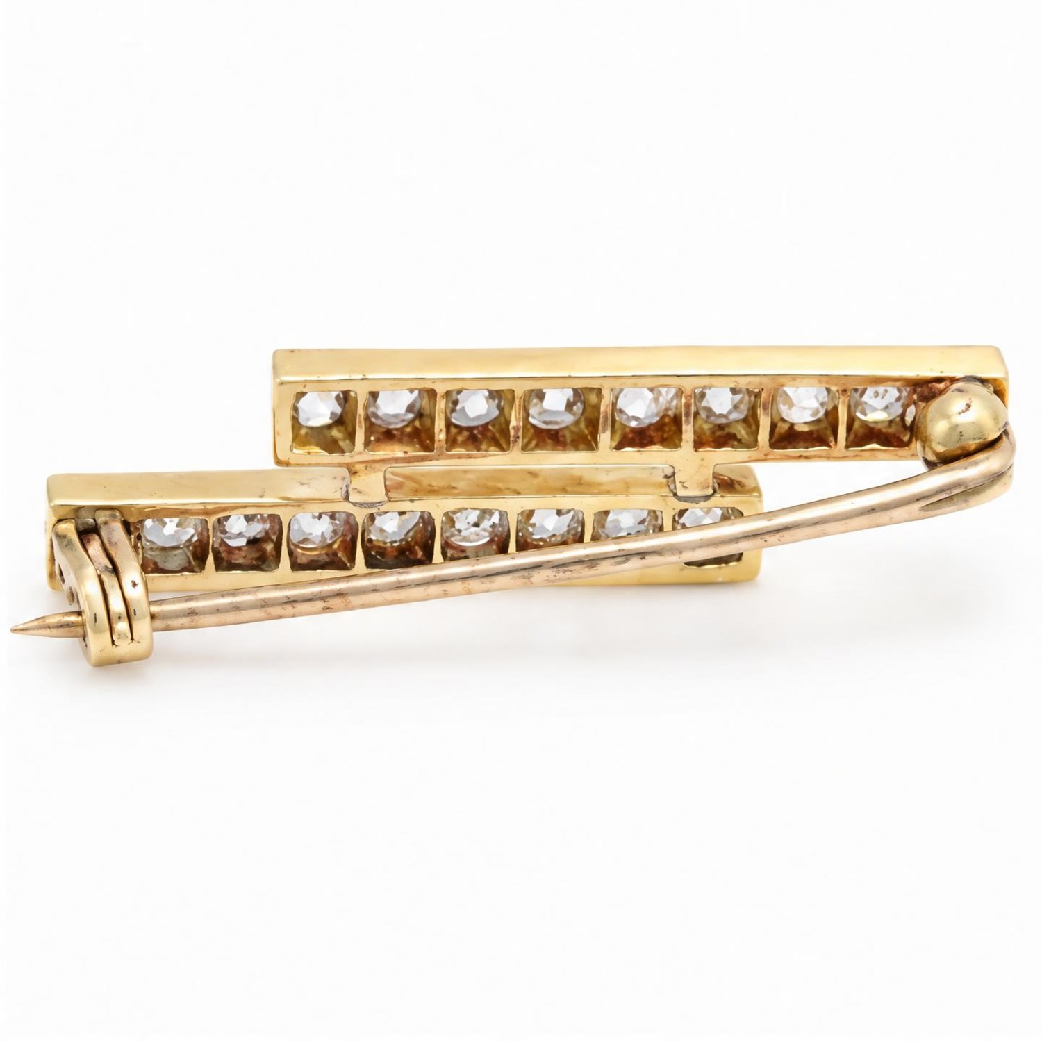 19th / early 20th century 18ct gold diamond brooch, two rows set each set with nine old cut diamonds, total diamond weight approx 0.90 carat