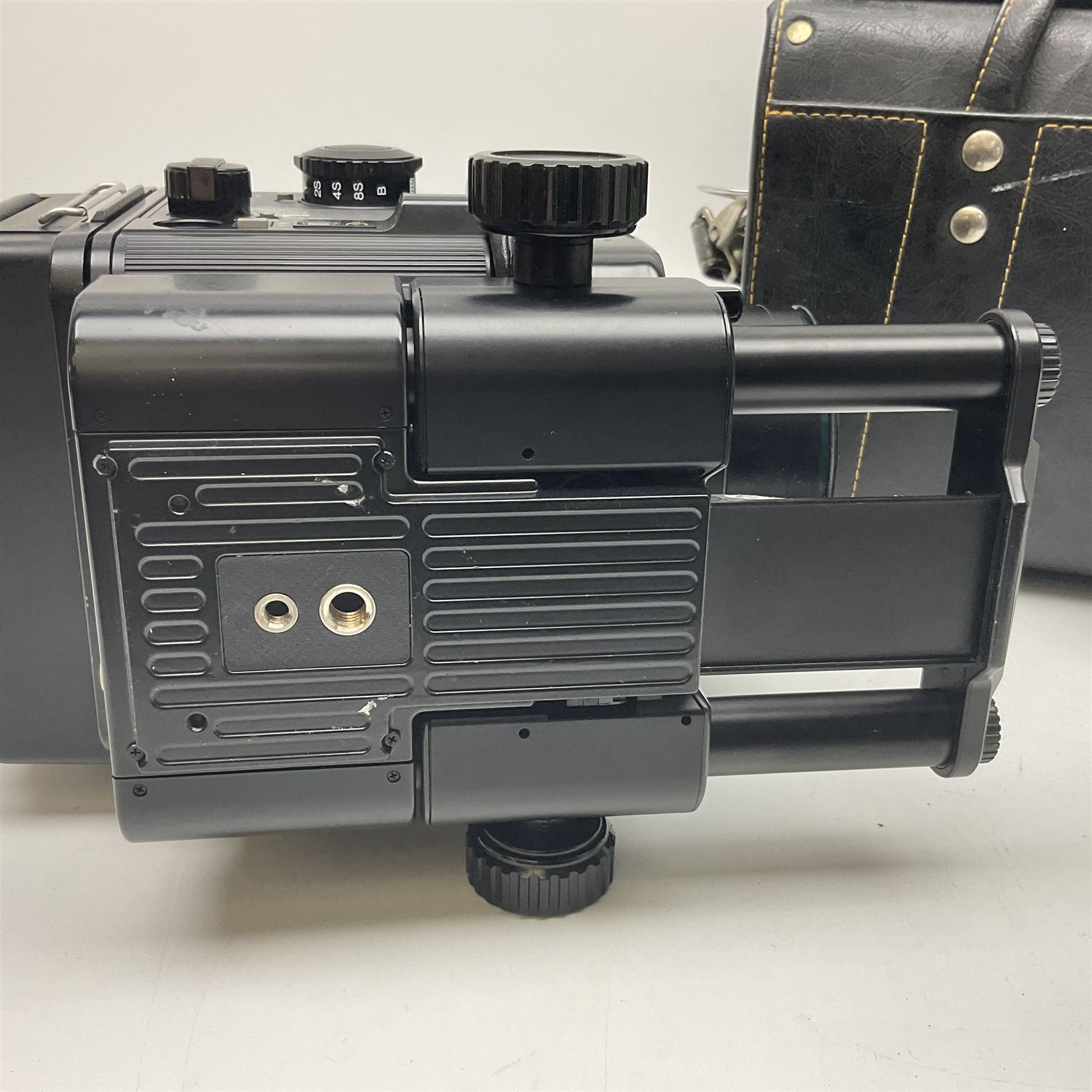 Fuji GX680 camera body with 8x6 film back, serial no. 702610, with 'Fuji EBC Fujion 100mm f4.0' lens, in leather case