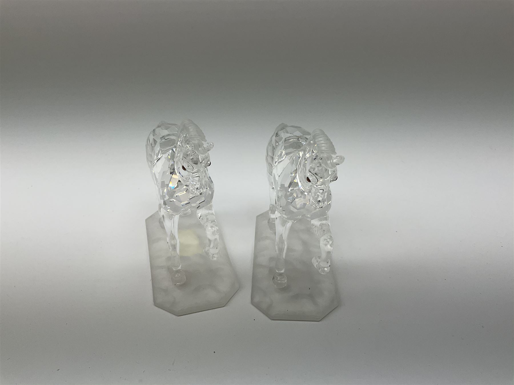 A pair of Swarovski Crystal horses H9.5cm, in original boxes