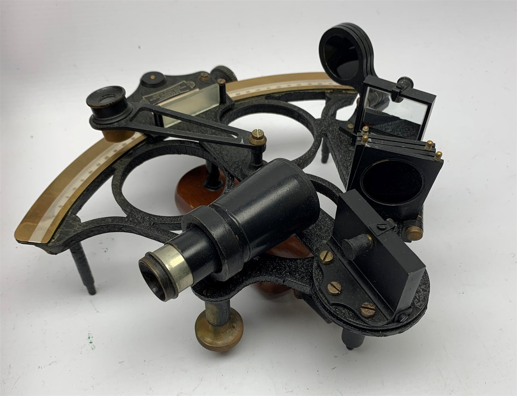 Heath & Co 'Hezzanith' sextant, pattern 491.V., with black crackled framework, brass arc with silvered scale, endless tangent screw and automatic clamp, bears label 'Cooke Hull', serial no.JJ375, in fitted mahogany box with additional lenses and Certificate of Examination dated October 1964. Inset plaque to box lid inscribed 'Cadet Capt. D.J. Walker H.S.N.T. 1983 - 84'. Provenance: Captain Walker was later in command of the North Sea Ferries ship Norland and the vendor is his widow.