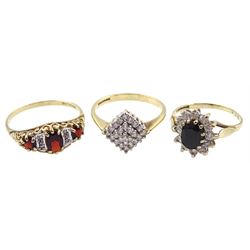 Gold garnet and diamond chip ring, gold cubic zirconia cluster ring and one other stone set dress ring, all hallmarked 9ct 