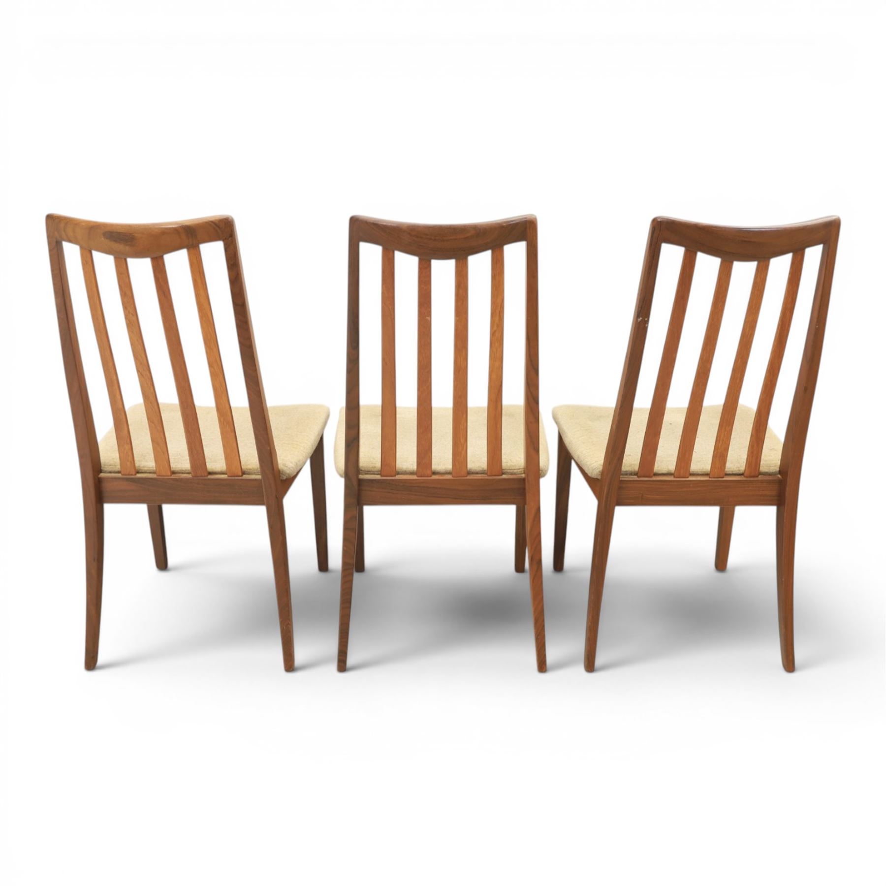 G-Plan - mid-20th century teak 'Fresco' circular extending dining table and six chairs, circular top with storable fold-over leaf extending to 166cm