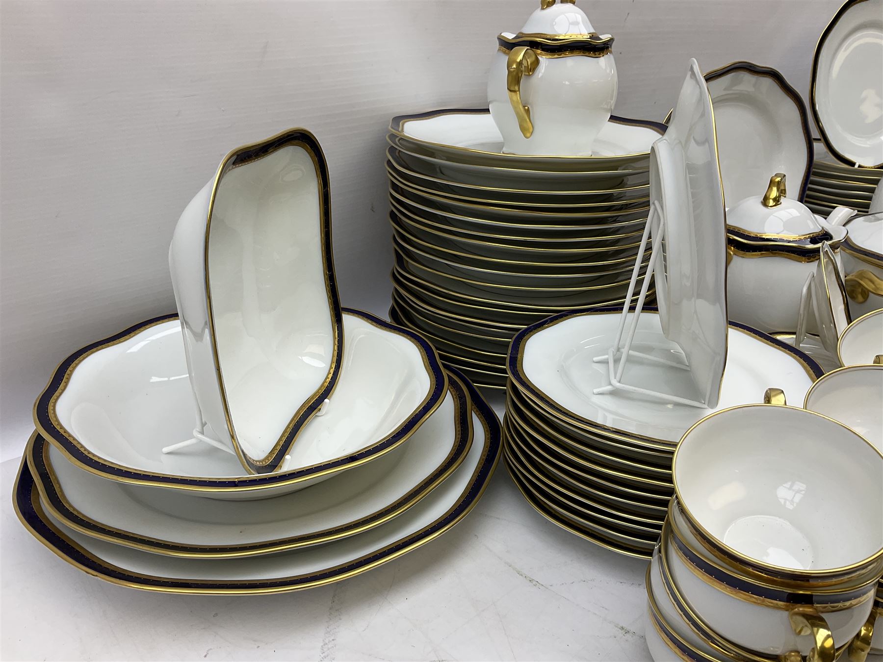 Pirkenhammer of Czechoslovakia Carlsbad pattern tea and dinner for twelve place settings to include dinner plates, soup bowls, side plates, covered tureen, tea cups and saucers, coffee cups and saucers, teapot, milk jug, covered surier, etc, with an addition twelve dinner plates (110)