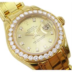 Rolex Oyster Perpetual Datejust Pearlmaster ladies 18ct gold automatic wristwatch, Ref. 69298, Serial No. T293223, champagne dial with diamond hour markers and diamond set bezel, on original 18ct Pearlmaster bracelet with fold-over clasp, with papers