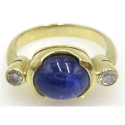  Gold ring set with cabochon sapphire and two diamonds, gold tested 14ct  