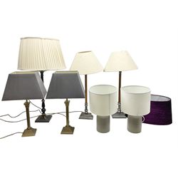 Quantity of modern table lamps to include pair of gilt metal corinthian column examples, pair of brushed metal and wood examples, etc, all with shades and an additional shade
