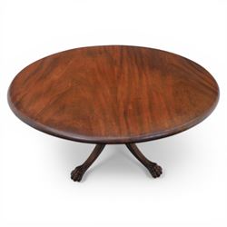 Victorian mahogany dining suite, oval tilt top dining table raised on a quatriform base with paw feet, together with a set of six balloon back dining chairs with green upholstery with cabriole legs 