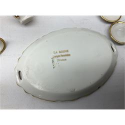 Limoges La Reine miniature furniture to include two chairs and table set, wardrobe etc, Limoges lidded boxes to include Bernadaud example, Limoges miniature tea service on tray, other boxes and miniatures to include Spode twin handled loving cup etc