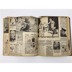 Album of WWII era paper ephemera, to include cartoon illustrations by George Goodwin Butterworth and Clive Uptton, articles and photographs