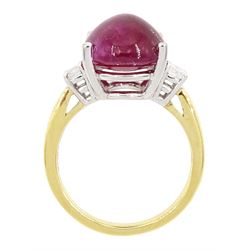 18ct gold ruby and diamond three stone ring, oval cabochon cut ruby of approx 11.40 carat, with a single round brilliant cut diamond set either side, hallmarked
