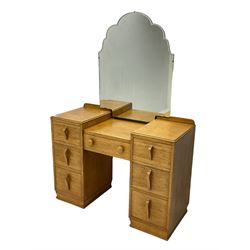 Mid-20th century light oak twin pedestal dressing table, shaped mirror back, fitted with seven drawers